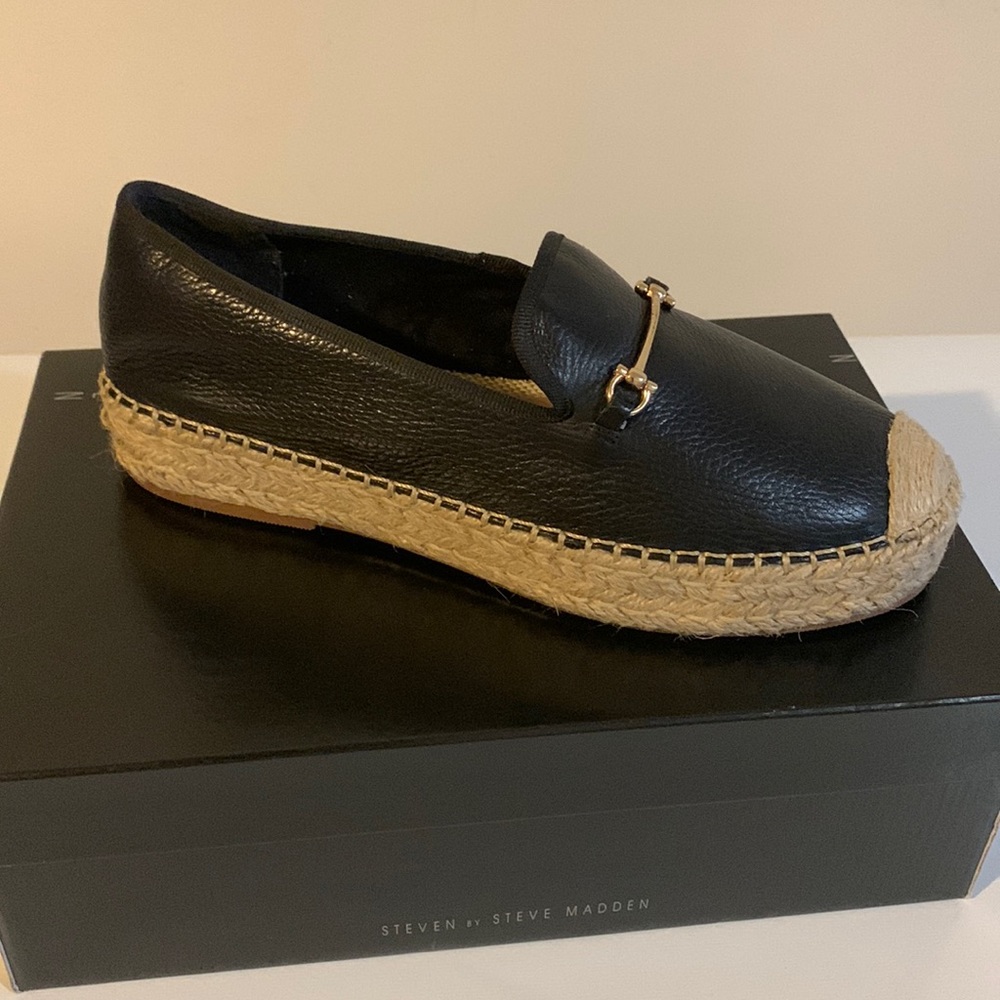 Brand new, never worn, leather